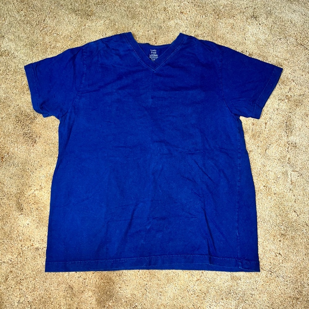 Plain lady foot locker shirt. Dark blue and hardly worn. Size x-large.